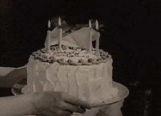 birthday-cake-candles-animated-gif-black-white-shirley-temple-blowing-out-.gif